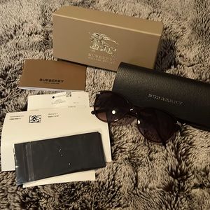 Brand new, never used Burberry sunglass. With box and everything.